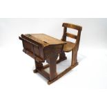 A child's pine combination desk and chair, the inkwell stamped Geo.M.