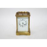 A brass quarter repeater carriage clock with winding key,