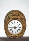 A French comtoise clock movement, the enamel dial with Roman numerals,