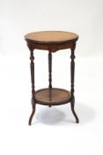 A late Victorian rosewood occasional table with under tier, 69cm high,