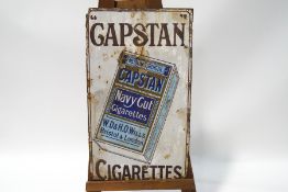 An enamel Will's Woodbine Cigarettes sign, 91cm x 62cm and a Capstan Cigarettes enamel sign,