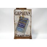 An enamel Will's Woodbine Cigarettes sign, 91cm x 62cm and a Capstan Cigarettes enamel sign,