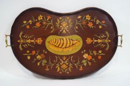 An Edwardian mahogany kidney shaped tray, with stained marquetry flowers and shell paterae,