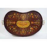 An Edwardian mahogany kidney shaped tray, with stained marquetry flowers and shell paterae,