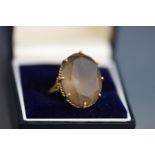 A 9 carat gold smokey quartz ring, finger size N, 9.