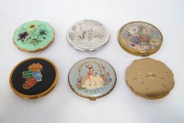 A collection of six 1950s ladies gilt metal powder compacts