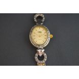 Oro, a diamond set lady's quartz bracelet watch, stamped '9kt', 19.