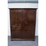 An Edwardian mahogany double wardrobe,