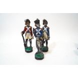 Three painted lead figures of soldiers, possibly French,