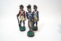 Three painted lead figures of soldiers, possibly French,