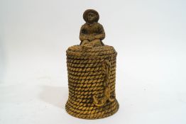 A Victorian earthenware tobacco jar and cover, in the form of a coil of rope,