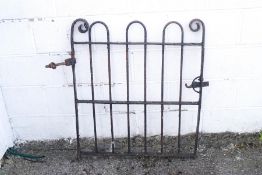 A single wrought iron gate,