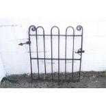 A single wrought iron gate,
