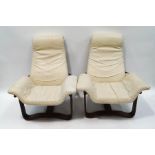 A pair of Norwegian bentwood armchairs with cream leather seats,