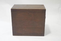 An Army and Navy oak chest with iron carrying handles,