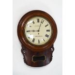 A drop dial wall clock, mahogany cased, the dial signed J.S.