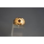 A 9 carat gold garnet ring, finger size S, 4.