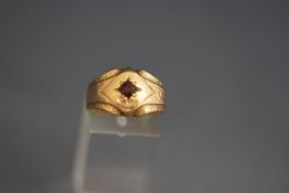A 9 carat gold garnet ring, finger size S, 4.