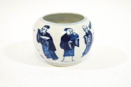 A Chinese porcelain vase of squat form, decorated with various figures in underglaze blue,