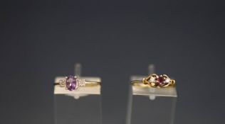 Two 9ct gold gem and diamond set dress rings;2.