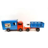 A Tri-ang horse transporter in red and blue livery, 46cm long, and a Tri-ang truck,