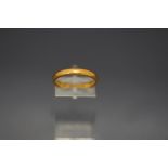 A 22 carat gold wedding ring, 4.