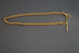 A 9ct gold watch chain, of curb links, with a T bar and a swivel, 28.