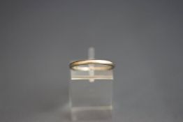 A wedding ring, stamped 'Platinum', 3.