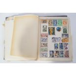 A Triumph stamp album with many well filled inserted extra pages,