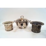 A pair of pierced silver plated wine coasters and a plated sauce warmer