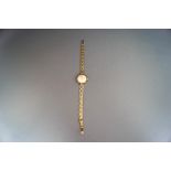 Rotary, a lady's 9 carat gold wrist watch on a bracelet,