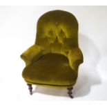 A small Victorian button back nursing chair,