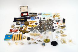 A collection of RAF related badges and coins
