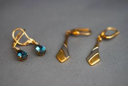 A pair of blue topaz and single cut diamond drop earrings,