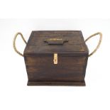 A wooden shotgun cartridge box with rope handles,