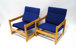 A pair of 1970's Habitat 'Campus' armchairs with beech frames and Pirelli rubber seat supports