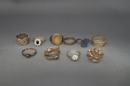 A collection of ten silver and silver coloured rings,