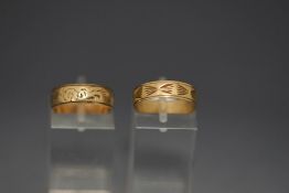 Two 9ct gold engraved wedding rings, 4.