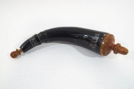 A cow horn black powder flask, with turned wood end and stopper,