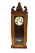 A part walnut regulator wall clock, with two weights and pendulum,