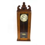 A part walnut regulator wall clock, with two weights and pendulum,