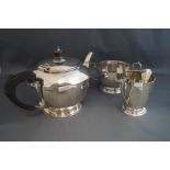 A silver three piece tea service, maker F.C.