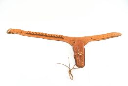 A Western tan leather rig with hand carved decoration