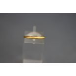 A 22 carat gold Wedding ring,