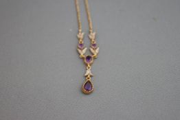 A 9ct gold amethyst and diamond pendant necklace, in the Edwardian style, 48 cm long, 3.