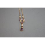 A 9ct gold amethyst and diamond pendant necklace, in the Edwardian style, 48 cm long, 3.