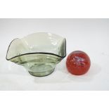 A Caithness 'Inferno' paperweight, and a square green glass dish,