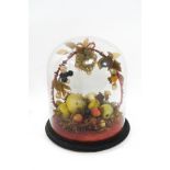 A Victorian wax group of fruit, under a glass dome and stand,
