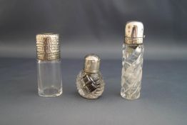 A late Victorian silver topped scent bottle,
