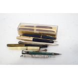 A collection of fountain pens and propelling pencils,